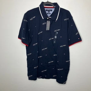 NUEVO CON ETIQUETAS TOMMY HILFIGER Polo ajustado estampado de logotipo azul marino grande - Imagen 1 de 4