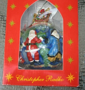 ADORNO CHRISTOPHER RADKO Feliz Navidad a Todo el Globo SANTA Alrededor del Mundo Bombilla - Imagen 1 de 12