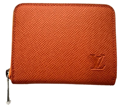 Cartera monedero Louis Vuitton con cremallera color naranja. Parece nuevo.  Foto 1 de 4