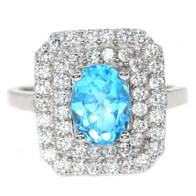 925 STERLING SILVER RING BLUE TOPAZ OVAL 9x 7 MM. & WHITE CZ GEMSTONE SIZE 6.5 - Image 1 of 4