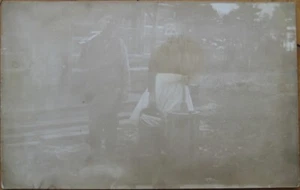 Native American Couple Grinding Corn 1910 Realphoto Postcard - Log Cabin - Picture 1 of 1