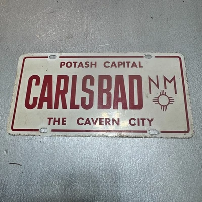 Original 1970's New Mexico Carlsbad License Plate Booster Potash Capital Cavern - Image 1 of 2