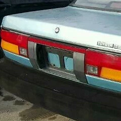 Toyota Tercel 2 Door, 1987, 1988, 1989, 1990, Center Tail Light, License Pocket - Image 1 of 4