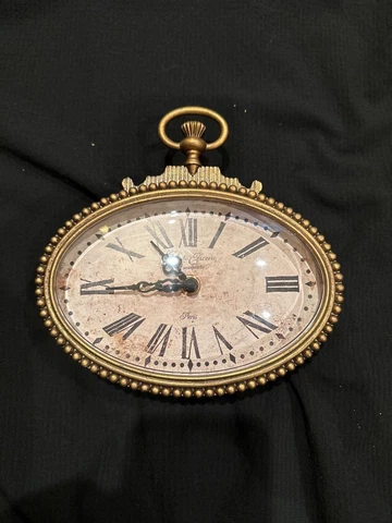 Romantic vintage table clock in baroque style Cover