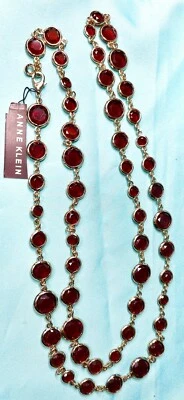 "Collar Anne Klein Facetado Rubí Rojo Cristal Espalda Abierta Tono Dorado 42"" Longitud" Foto 1 de 4