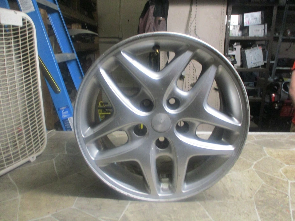 Llanta Dodge Intrepid 2001-2004 stock de fábrica 16x7 5 orejetas 4-1/2" OEM 10 radios  Foto 1 de 4