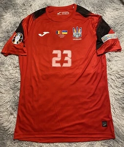 CAMISETA UCRANIA FIRMADA USADA PARTIDO LUNIN #23 Real Madrid Euro 2024 VS Rumania - Imagen 1 de 10