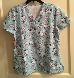 NWT PEANUTS CHRISTMAS SNOOPY WOMENS SCRUB TOP Shirt CANDY CANES Sizes M Or L - Picture 1 of 9