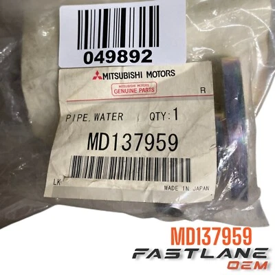 MITSUBISHI MONTERO 1989-1996 MOTOR REFRIGERANTE SALIDA BRIDA NUEVO FABRICANTE DE EQUIPOS ORIGINALES MD137959 Foto 1 de 4