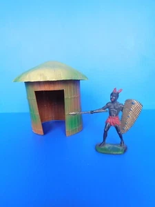 CLAIRET / L'AFRIQUE / DECOR : RARE HUTTE avec un guerrier africain - Imagen 1 de 6