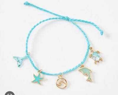 Claire’s Azul Delfín Estrella Pez Tortuga Tono Dorado Dije Pulsera Joyería Foto 1 de 3
