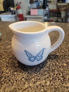 Dolly Parton Crema Mariposa Azul - Imagen 1 de 4