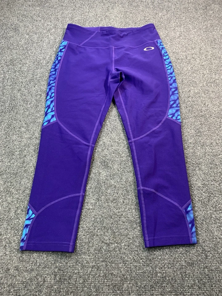 Leggings Oakley para mujer pequeños morados pierna cónica elásticos ligeros Foto 1 de 4