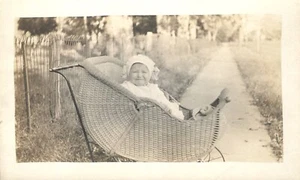 Baby with Cap Sitting Up in Wicker Carriage RPPC Real Photo Postcard - Picture 1 of 2
