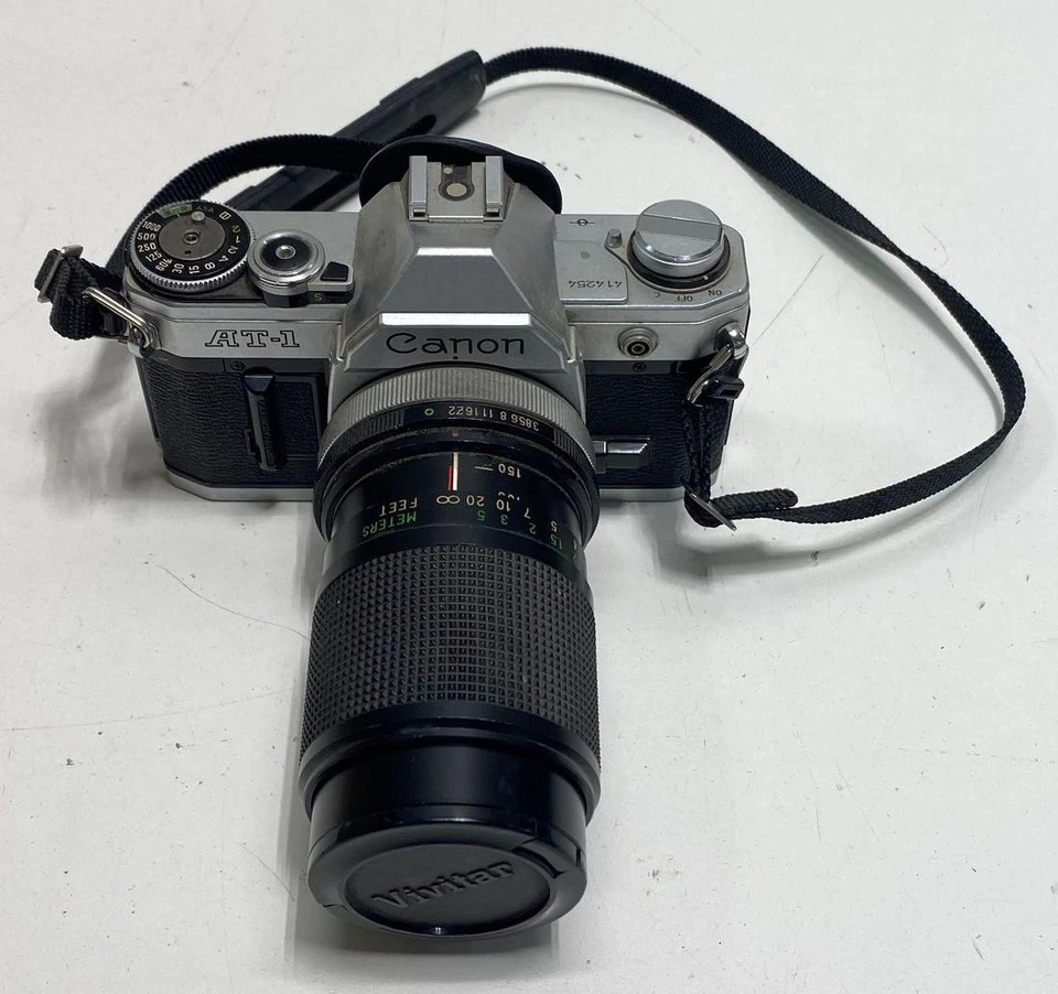 Cámara Canon AT-1 35mm SLR con Lente-PARA REPUESTOS O REPARACIÓN Foto 1 de 4