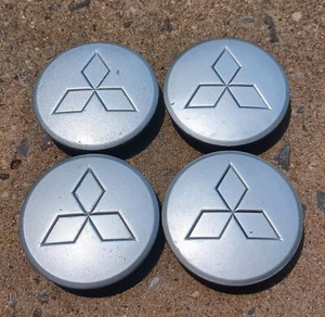 Mitsubishi Eclipse Endeavor Galant center cap set of 4, 2004-2011 p/n MB554487 - Picture 1 of 3