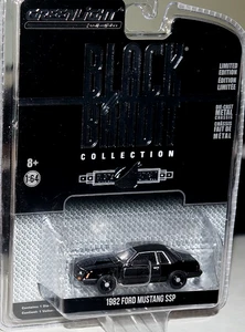 Greenlight 1/64 1982 Ford Mustang SSP Foxbody 5.0 schwarz Polizeiauto Diecast - Bild 1 von 1