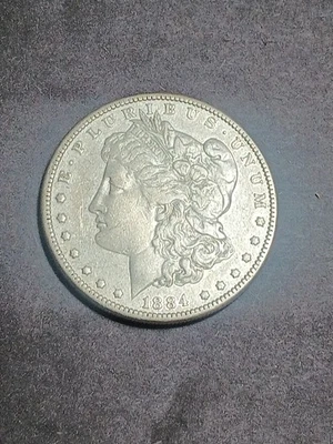 1884 $1 90% PLATA DÓLAR MORGAN EN EXCELENTE ESTADO ENVÍO DESDE ESTADOS UNIDOS Foto 1 de 4