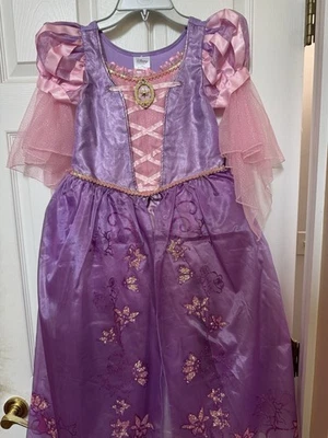 Disfraz y tiara Disney Rapunzel para niños talla 7-8; nuevo con etiquetas; muy buen estado Foto 1 de 4