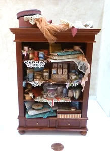 DOLLHOUSE MINIATURE CABINET FILLED WITH SEWING ITEMS RIBBONS, MATERIALS, ETC. - Picture 1 of 5