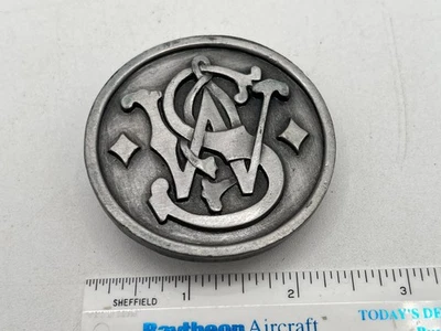 De colección Bergamota 1989 Smith & Wesson Armas de Fuego S&W Logo A-300 Hebilla de Cinturón Redonda Foto 1 de 3