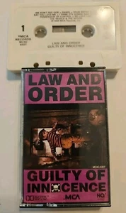 Law And Order – Guilty Of Innocence Cassette Tape 1989 MCA Records MCAC-6327  - Foto 1 di 6