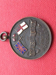 PRESENTED BY NEWS OF THE WORLD FOR MY FIRST SUCCESS. BRONZE MEDAL 32mm wide. - Picture 1 of 3