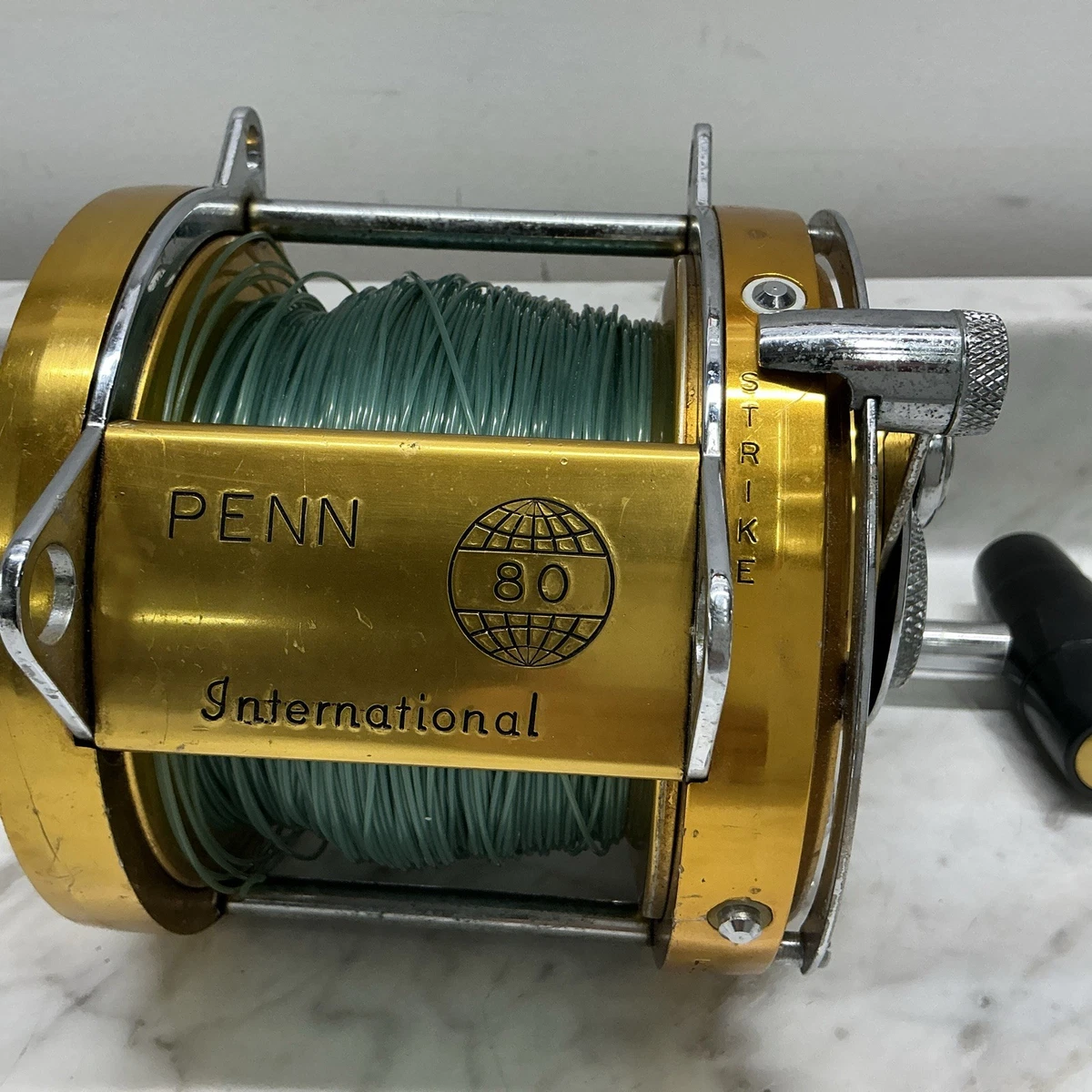 Preços baixos em Penn International 80 Molinetes de pesca para