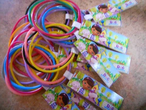 12 set bracciali bomboniera festa compleanno Doc McStuffins con etichetta Disney personalizzata  - Foto 1 di 5