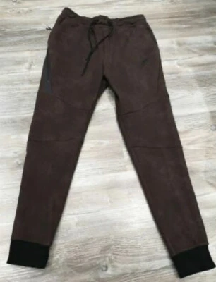 CALÇA MASCULINA NIKE TECH PACK PERNA CÔNICA MÁXIMA "ECLIPSE DE AMEIXA" (BV3546 291) TAMANHO MÉDIO - Imagem 1 de 2