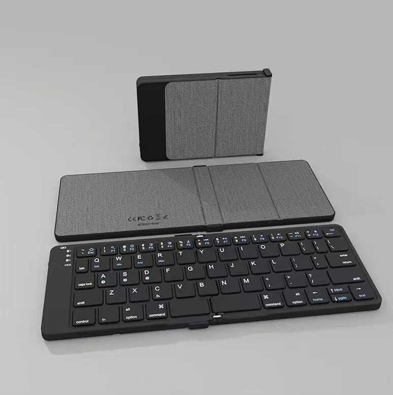 Magnetic Foldable Mute Ultrathin Portable for IOS Win Android Wireless Keyboard - Image 1 of 4