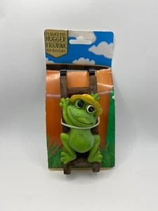 Rana nuova - Statuina da giardino abbraccia vaso da fiori - Foto 1 di 2