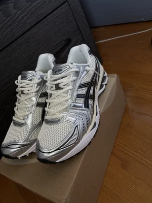 ASICS Gel-Kayano 14 "Cream Black Metallic Plum"