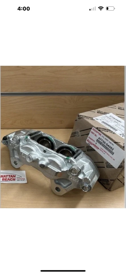 Pinza de freno delantera derecha genuina OEM 2005-2023 Toyota Tacoma 6 tacos 47730-04092 Foto 1 de 1