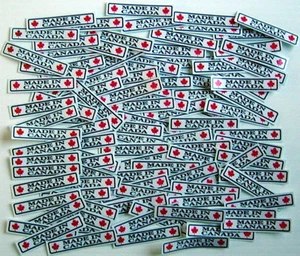 LOT OF 100 "MADE IN CANADA" GLOSSY STICKERS, APPROXIMATIVELY SIZE:½"x 2¼" EACH - Imagen 1 de 5