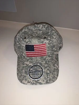 New, Camouflage Zephyr Hat. Adjustable Size, American Flag Logo - Image 1 of 4