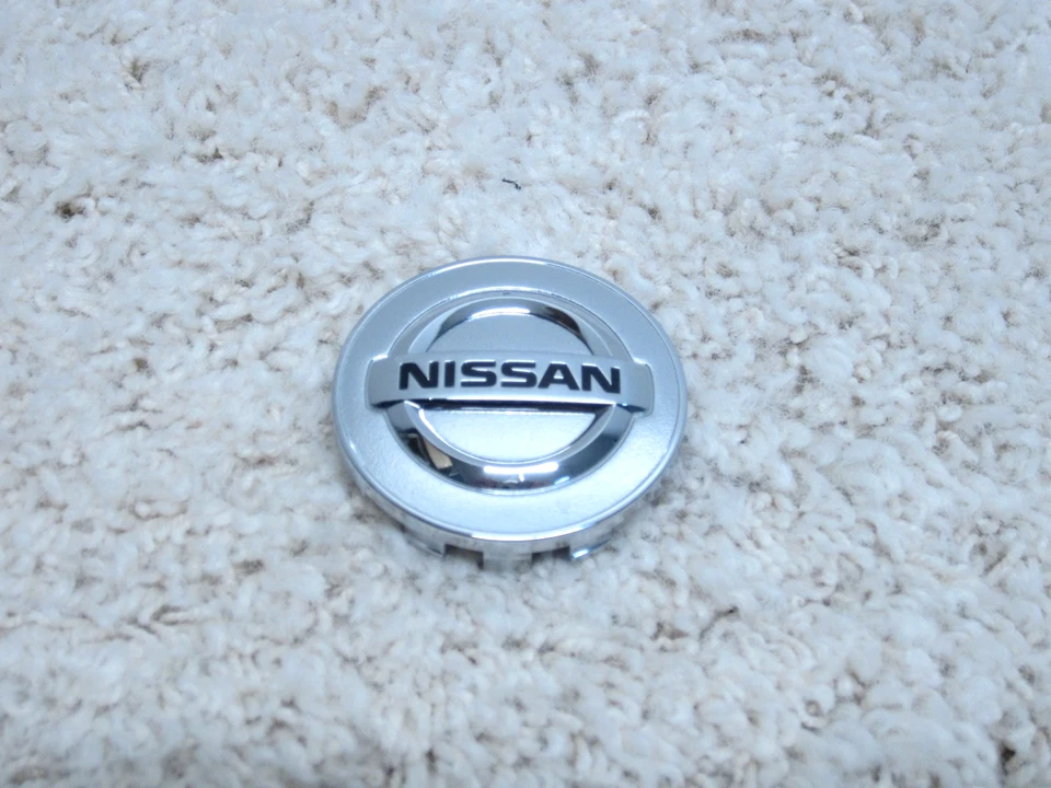 Tapa central de llantas de aleación Nissan Cube, Juke, Leaf, NV200 OEM 40343-2DR0A #2B-10 Foto 1 de 2