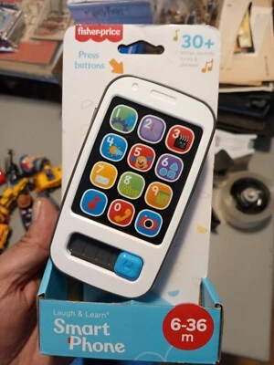 Teléfono inteligente Fisher Price Laugh & Learn bebé niño pequeño canciones preescolares sonidos melodías Foto 1 de 2