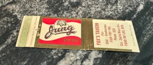 B) VINTAGE JUNG BEER MATCHBOOK COVER RANDOM LAKE WI FOX'S TAVERN FOND DU LAC WI - Picture 1 of 3