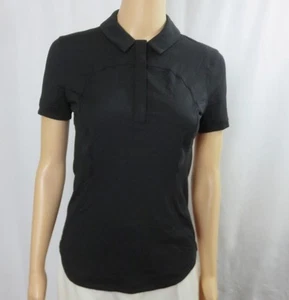 Polo Lululemon nera asciugatura rapida manica corta top colletto abbottonato TG 4 - Foto 1 di 5