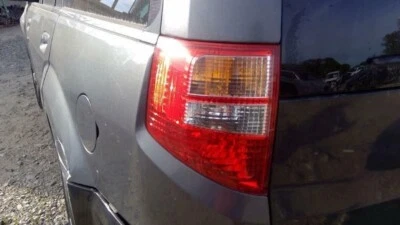 Conjunto de lámpara de luz trasera ISUZU AXIOM lado izquierdo del conductor 02 03 04 Foto 1 de 4