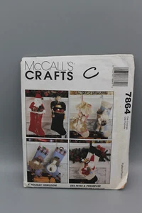 MCALL'S CRAFTS PATRÓN DE MEDIAS DE NAVIDAD 7864 SIN CORTAR ÁNGEL SANTA MUÑECO DE NIEVE - Imagen 1 de 5