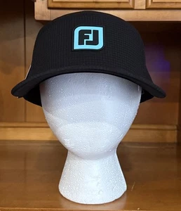 Sombrero de golf FootJoy negro con detalles de goma azul bebé cierre a presión - Imagen 1 de 5