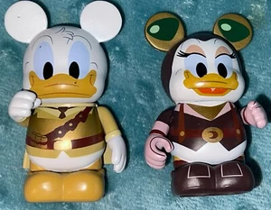 Figuras retiradas de 3"" Disney Vinylmation Mechanical Kingdom Daisy & Donald Duck - Imagen 1 de 2