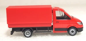 Herpa 093712, MAN TGE, Einfachkabine mit Pritsche und Plane, rot, 1/87, NEU&OVP - Bild 1 von 6