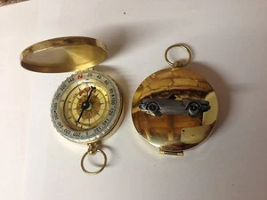 Triumph Spitfire 1500 ref260  pewter effect car emblem on a Golden Compass - Picture 1 of 1