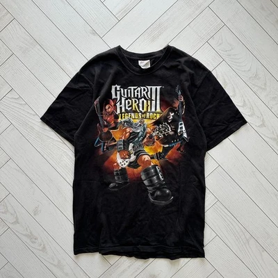 De colección 00s Guitar Hero 3 Legends of Rock God Rock juego camiseta computadora geek y2k Foto 1 de 4