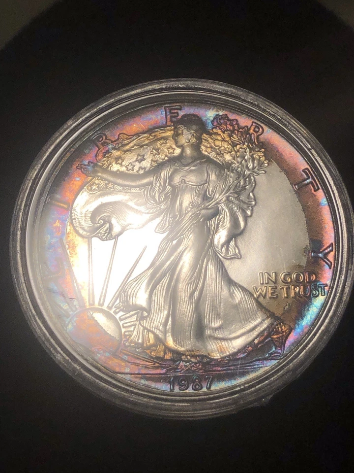 1987 American Silver Eagle 1 Oz Rainbow Toning  - Image 1 of 4