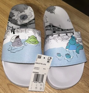 Adidas Disney Pixar Monsters Inc. Adilette Lite Slides GX0995 da uomo taglia 7 NUOVE - Foto 1 di 5