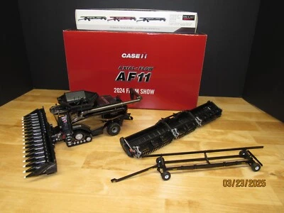1/64 Case IH AF11 Combine 2024 Farm Show Chase w/ Black Unverferth Header Cart - Image 1 of 4